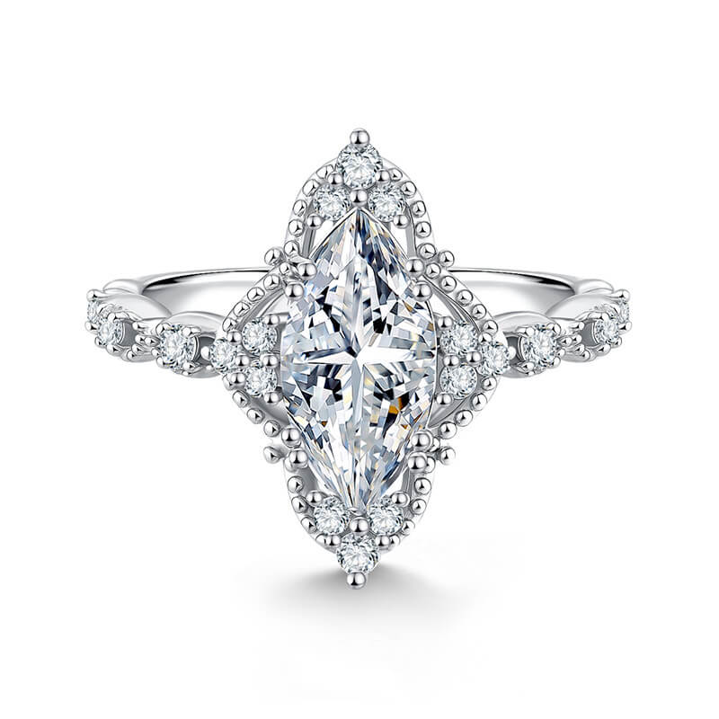 Diamond ring with a marquise-shaped center stone on a white background